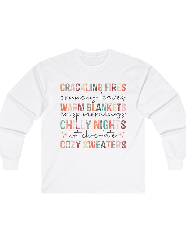 Crackling Fires, Warm Blankets, Chilly Nights, and Cozy Sweaters in this Cozy Long-Sleeve Tee!